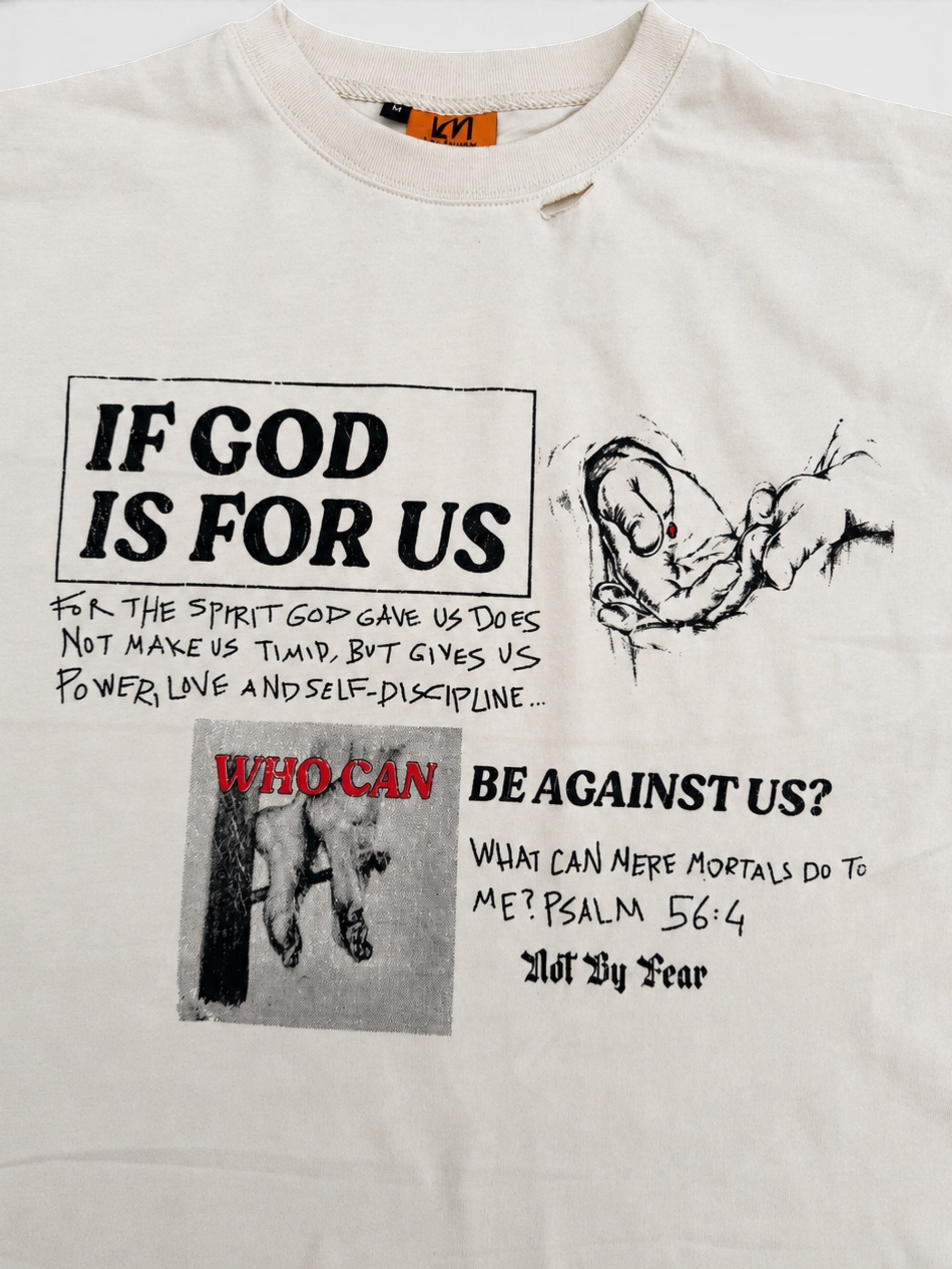 Mere Mortals distressed tee graphic detail close-up
